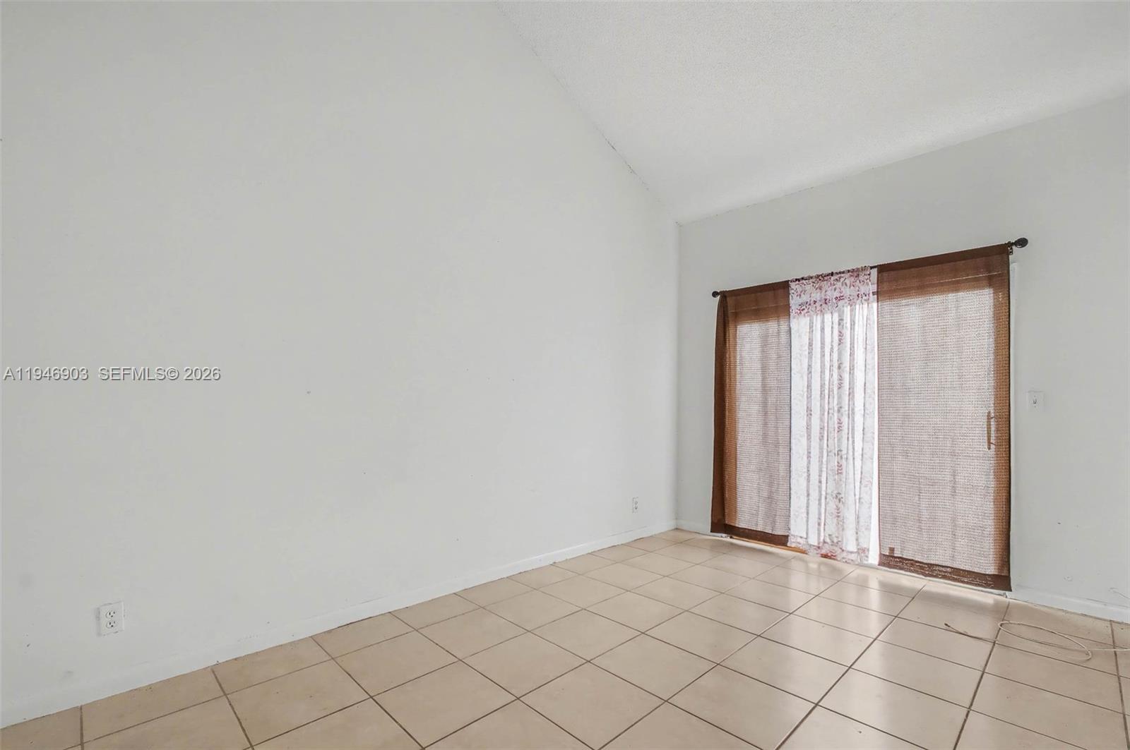5510 Northwest 24th Street Lauderhill, FL 33313 - Photo 4 of 25 a view of an empty room and window