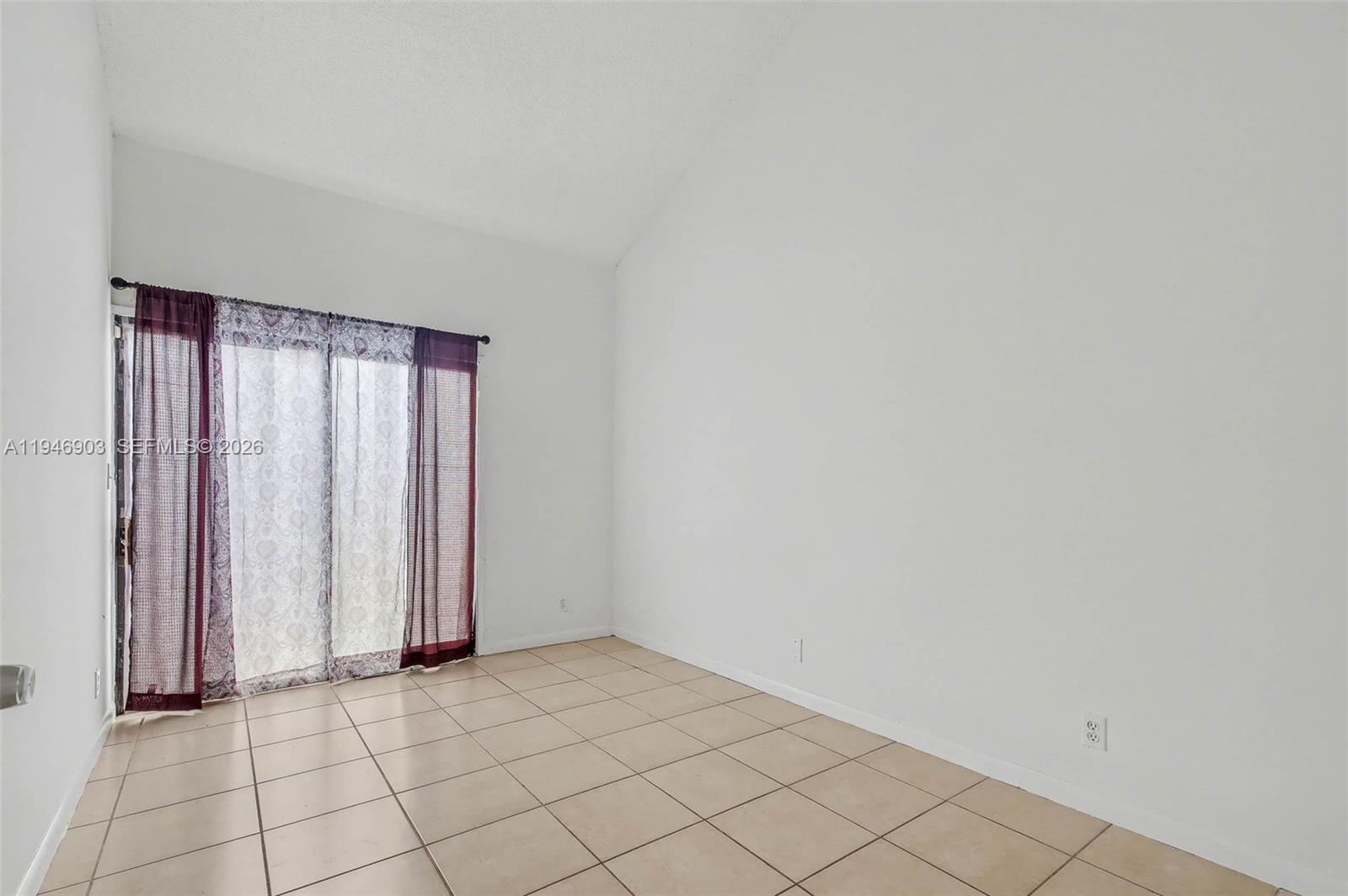 5510 Northwest 24th Street Lauderhill, FL 33313 - Photo 6 of 25 a view of an empty room and window