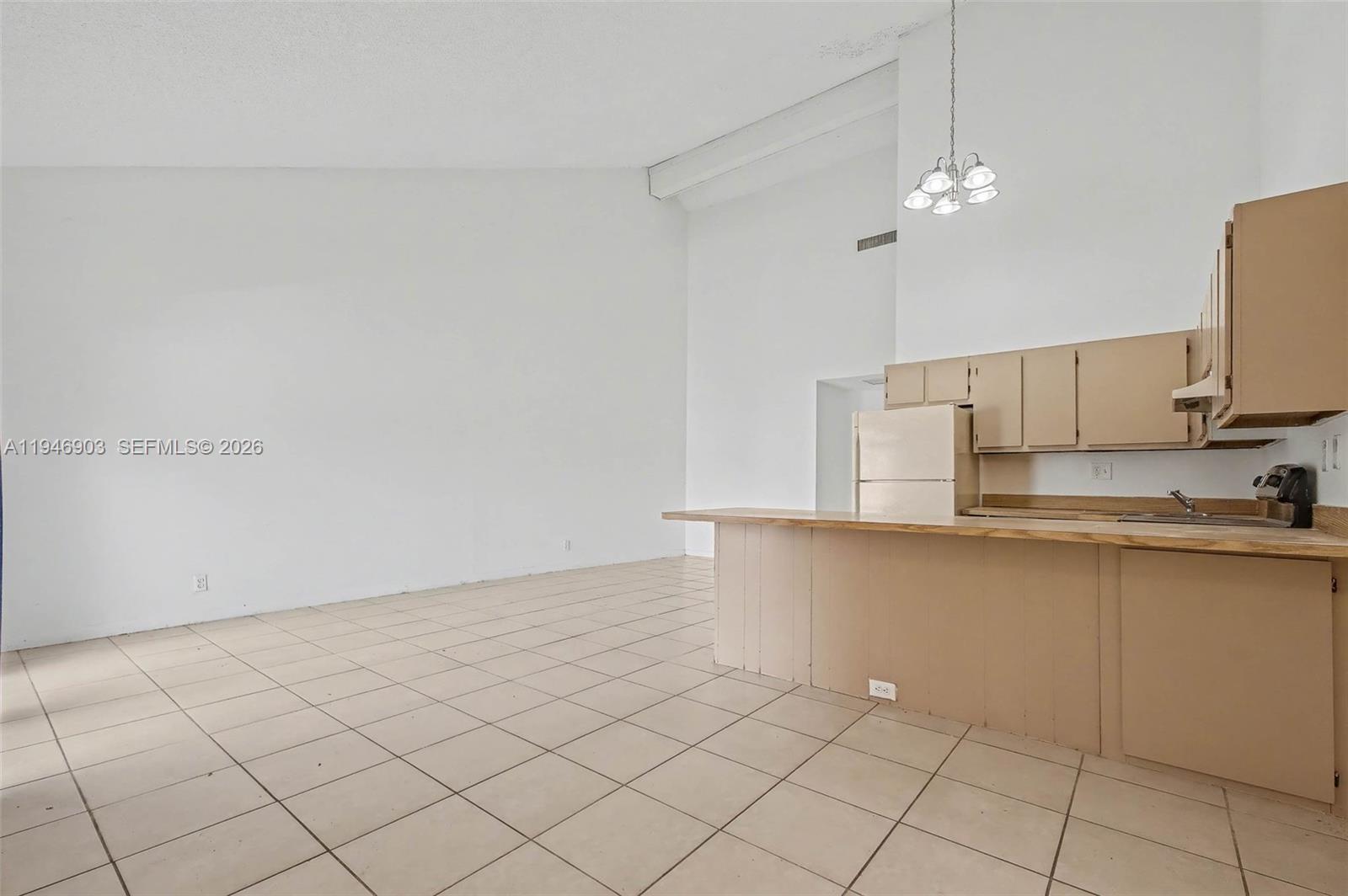 5510 Northwest 24th Street Lauderhill, FL 33313 - Photo 7 of 25 a kitchen with a sink cabinets and appliances