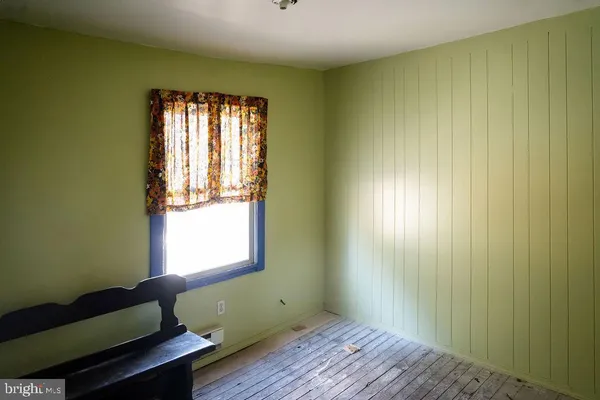an empty room with a window