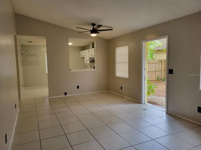 a view of an empty room and window