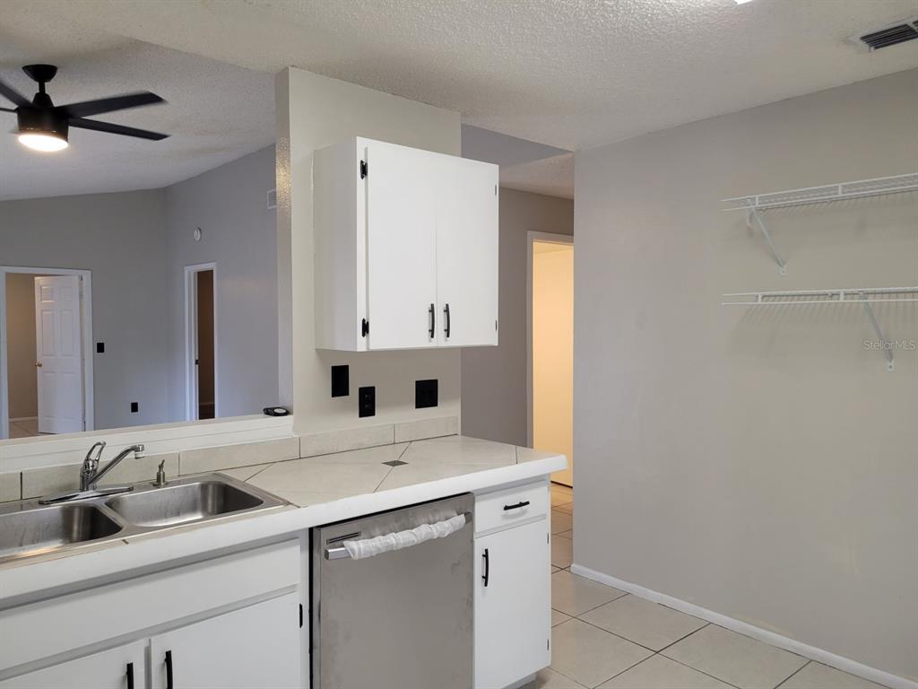 3133 Huron Avenue Oldsmar, FL 34677 - Photo 16 of 43 a utility room with dryer and washer