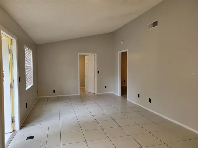 a view of an empty room with window