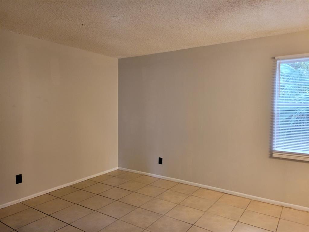 3133 Huron Avenue Oldsmar, FL 34677 - Photo 18 of 43 a view of an empty room and window