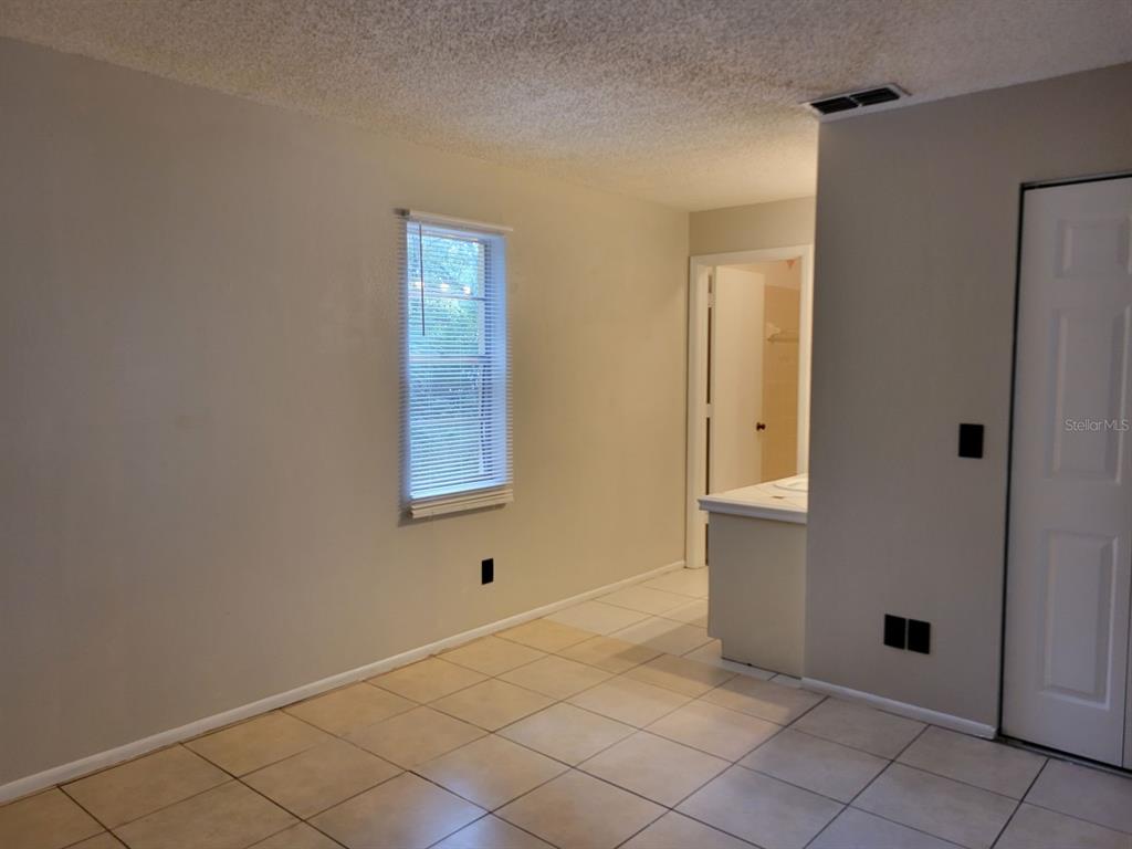3133 Huron Avenue Oldsmar, FL 34677 - Photo 19 of 43 a view of an empty room with window