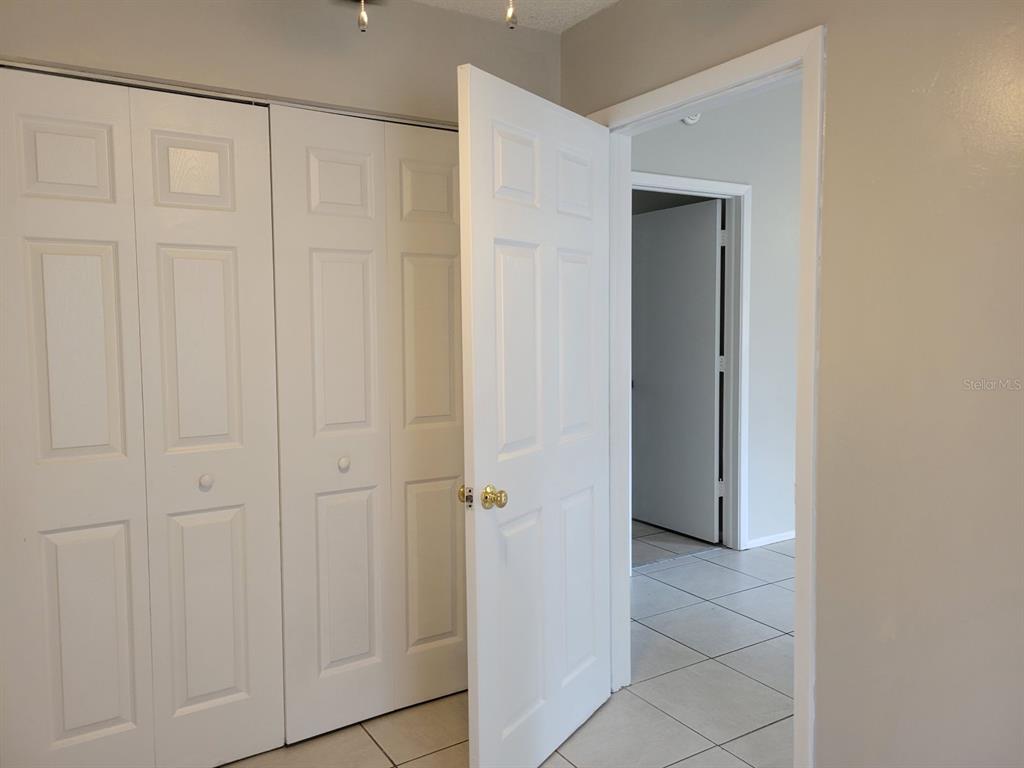 3133 Huron Avenue Oldsmar, FL 34677 - Photo 25 of 43 a view of a closet area with empty room