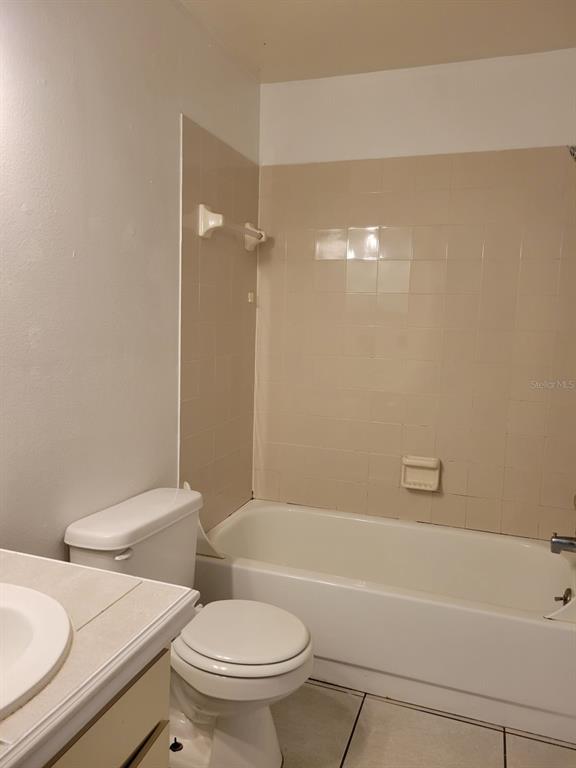 3133 Huron Avenue Oldsmar, FL 34677 - Photo 29 of 43 a white toilet sitting next to a bath tub