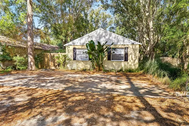 a view of a back yard of the house