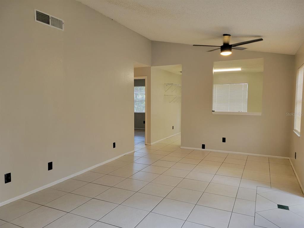 3133 Huron Avenue Oldsmar, FL 34677 - Photo 10 of 43 a view of an empty room with a window