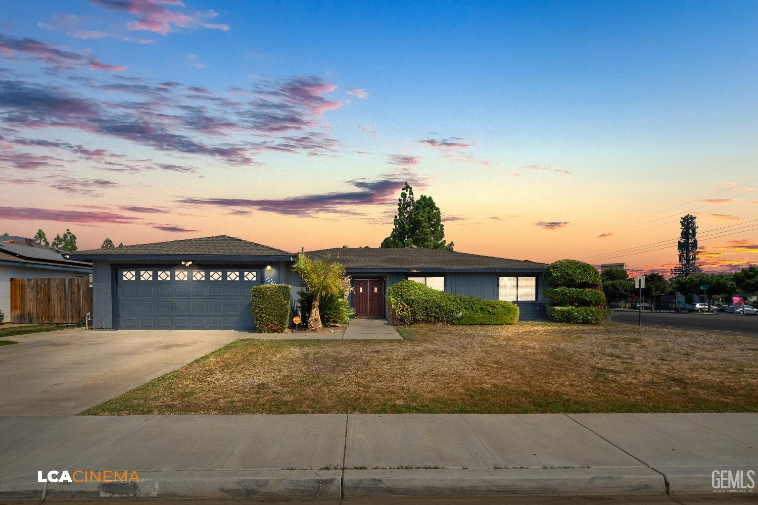 Undisclosed Address Bakersfield, CA 93306 - Photo 1 of 34 a view of house with a yard