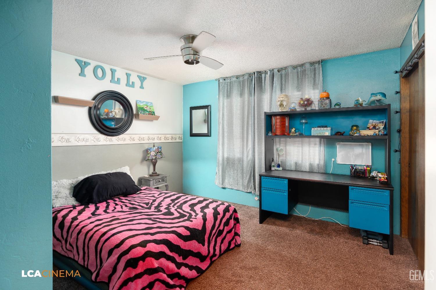 Undisclosed Address Bakersfield, CA 93306 - Photo 17 of 34 a bedroom with a bed and a closet