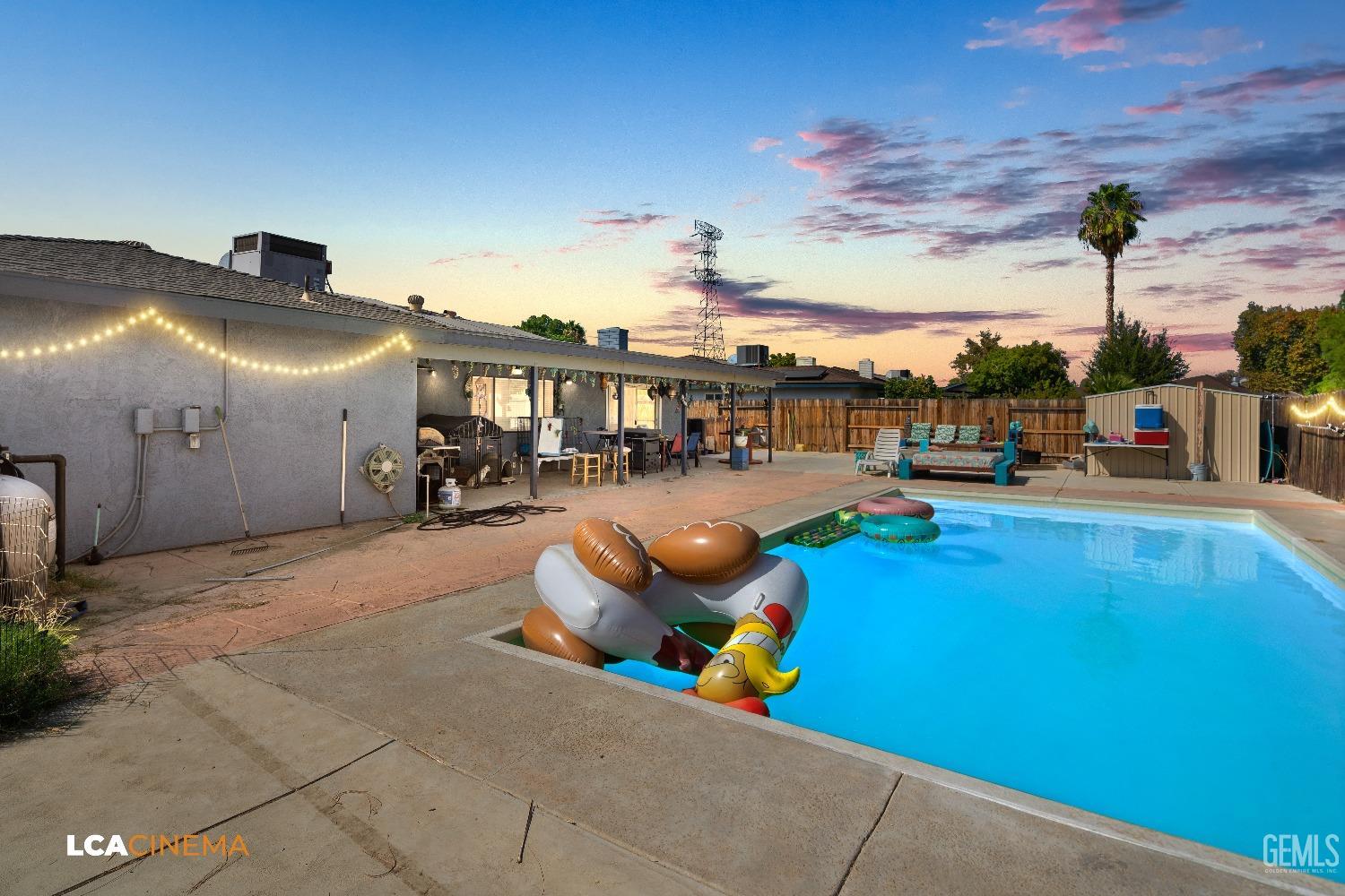 Undisclosed Address Bakersfield, CA 93306 - Photo 23 of 34 a view of a patio with swimming pool