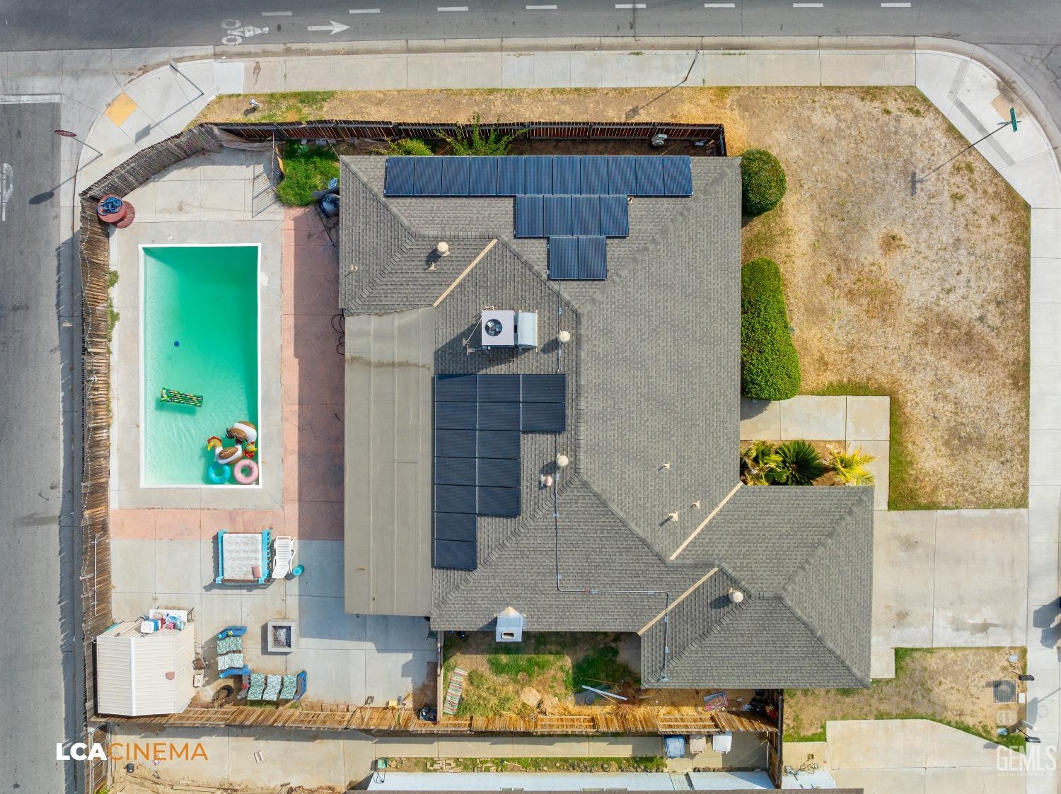 Undisclosed Address Bakersfield, CA 93306 - Photo 27 of 34 an aerial view of a house with a swimming pool