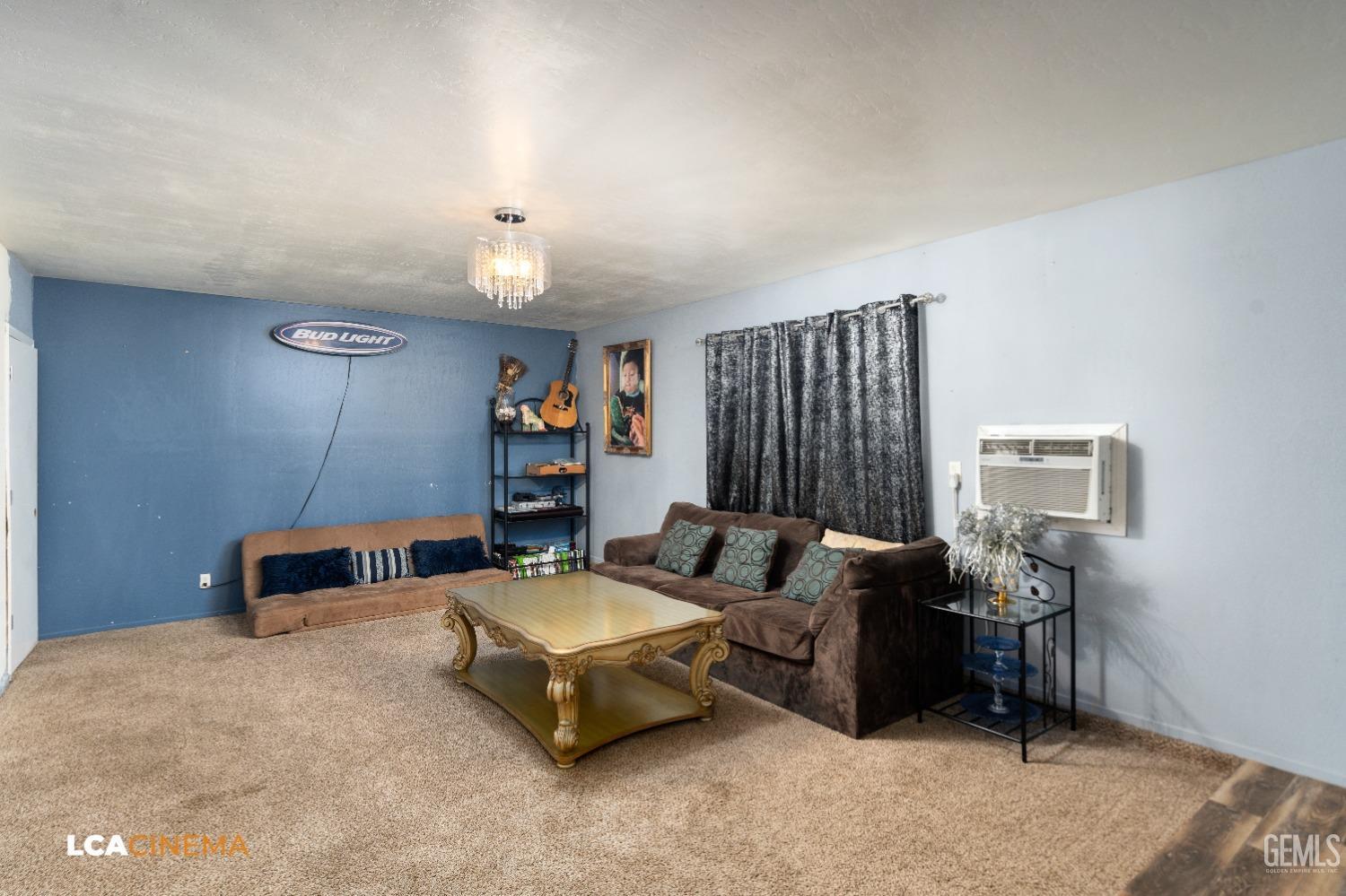 Undisclosed Address Bakersfield, CA 93306 - Photo 5 of 34 a living room with furniture and a window