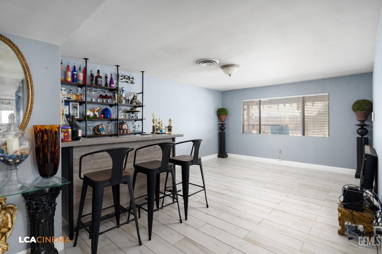 Undisclosed Address Bakersfield, CA 93306 - Photo 6 of 34 a dining room with furniture and window