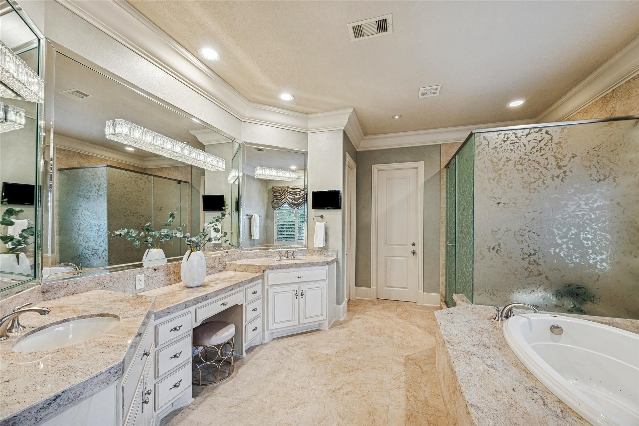13907 Slate Creek Lane Houston, TX 77077 - Photo 15 of 29 a spacious bathroom with a granite countertop double vanity sink a mirror and a bathtub