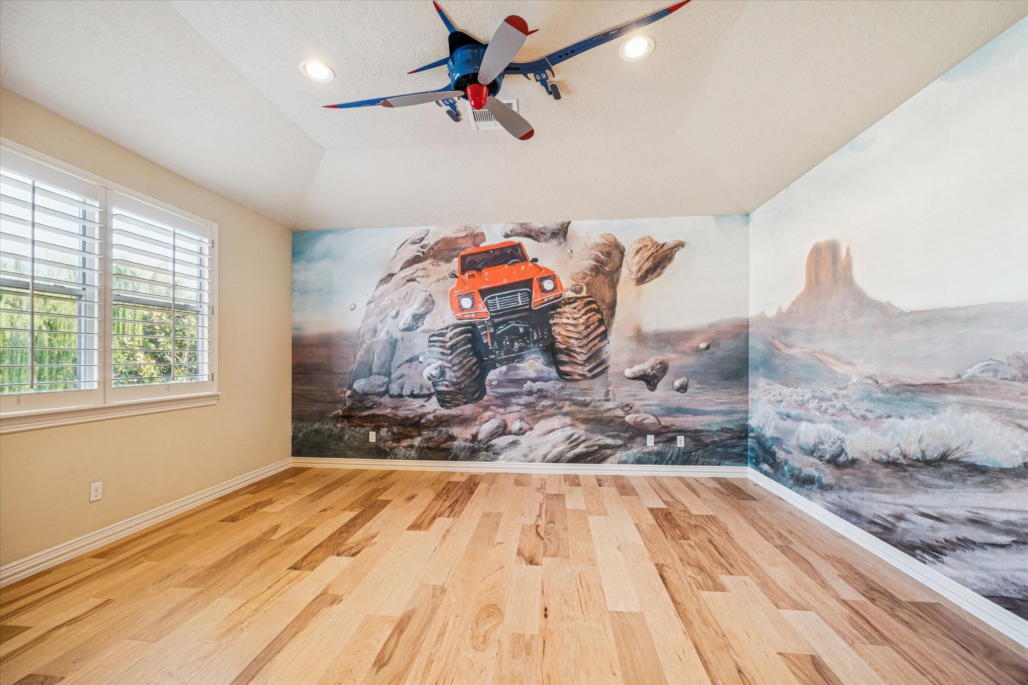 13907 Slate Creek Lane Houston, TX 77077 - Photo 22 of 29 a bedroom with a bed and a dresser