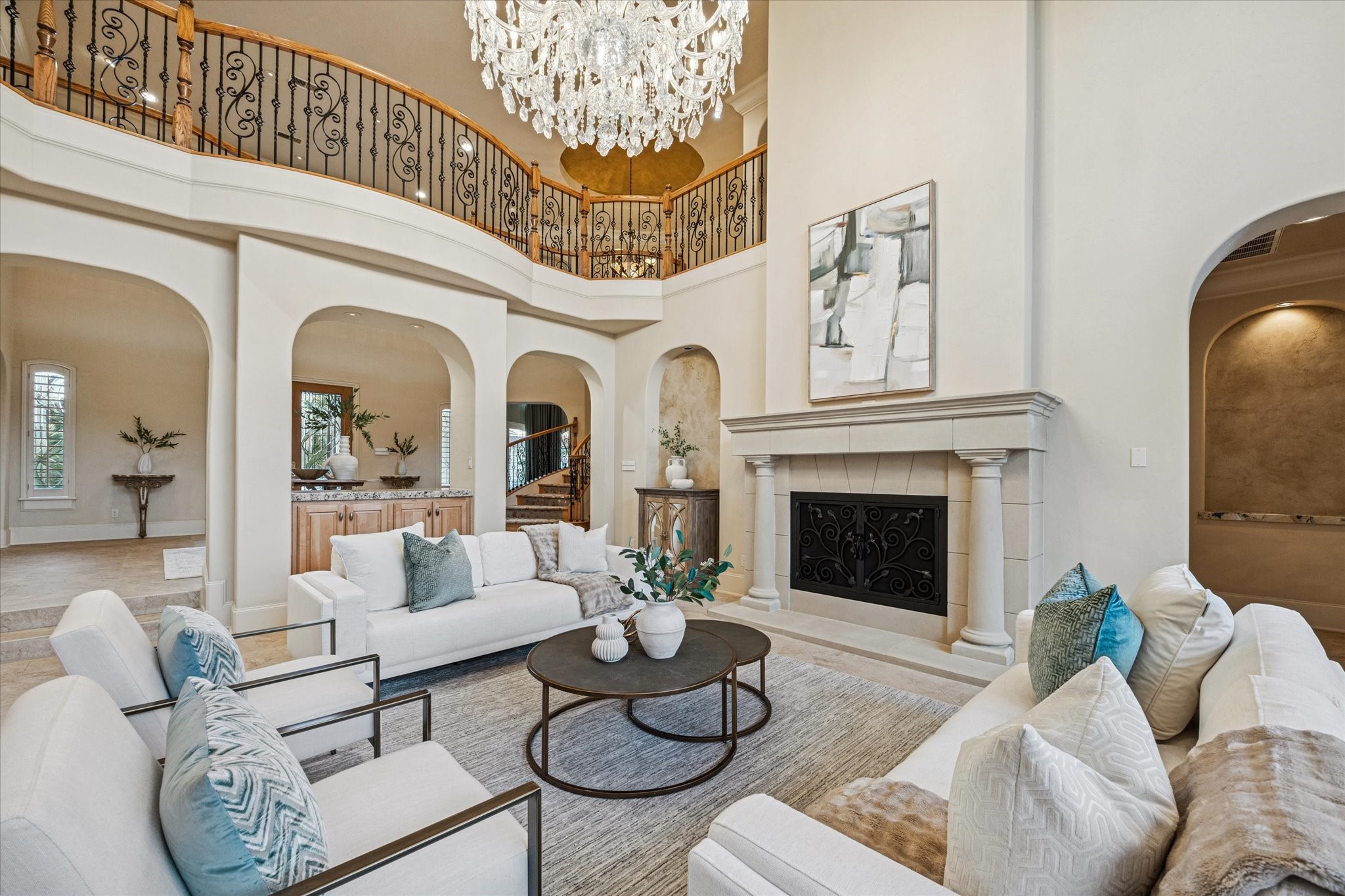 13907 Slate Creek Lane Houston, TX 77077 - Photo 5 of 29 a living room with furniture a fireplace and a chandelier