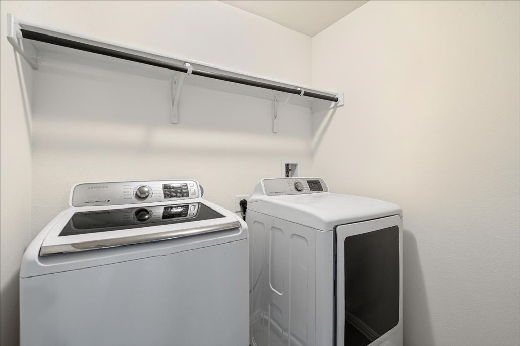 1609 Catalan Road, Unit 1802 Austin, TX 78748 - Photo 24 of 25 Laundry area featuring separate washer and dryer