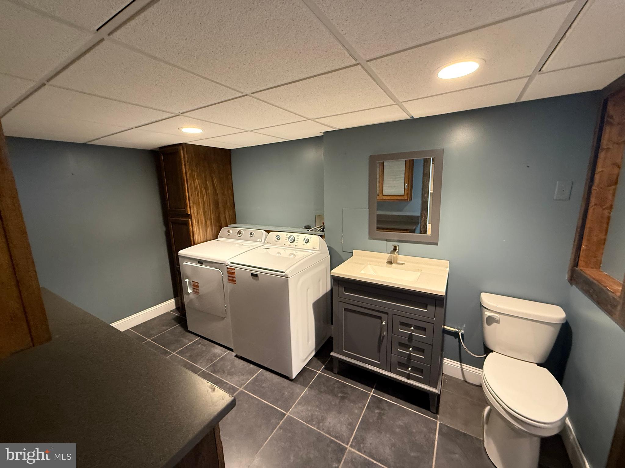 858 Star Court Union Bridge, MD 21791 - Photo 28 of 37 a utility room with dryer washer and sink