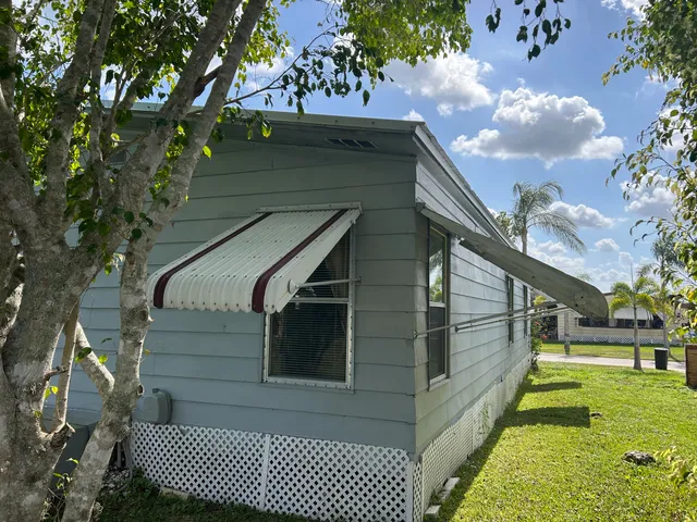 a view of a balcony with a chair