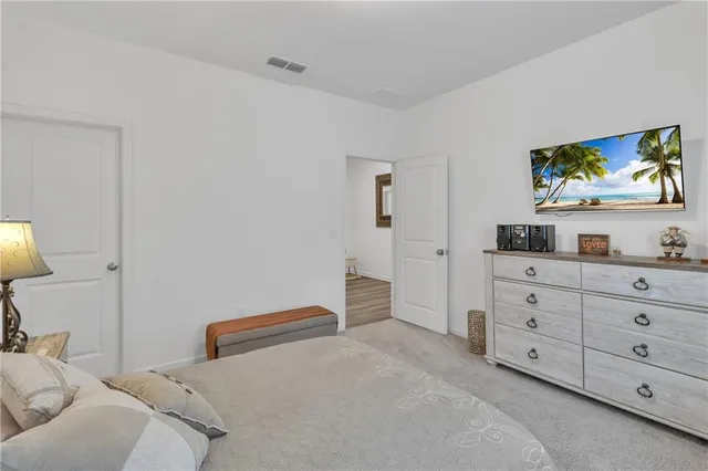 a kitchen with stainless steel appliances kitchen island granite countertop a sink and cabinets