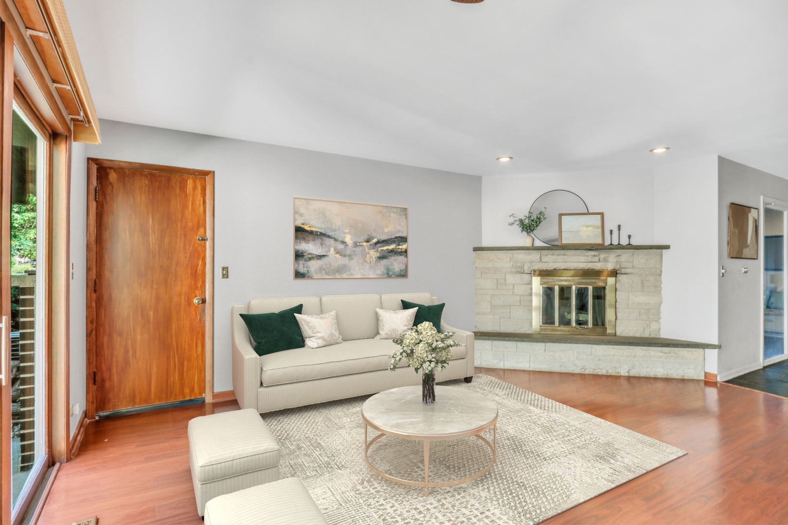 230 North Alleghany Road Grayslake, IL 60030 - Photo 15 of 53 a living room with furniture and a fireplace