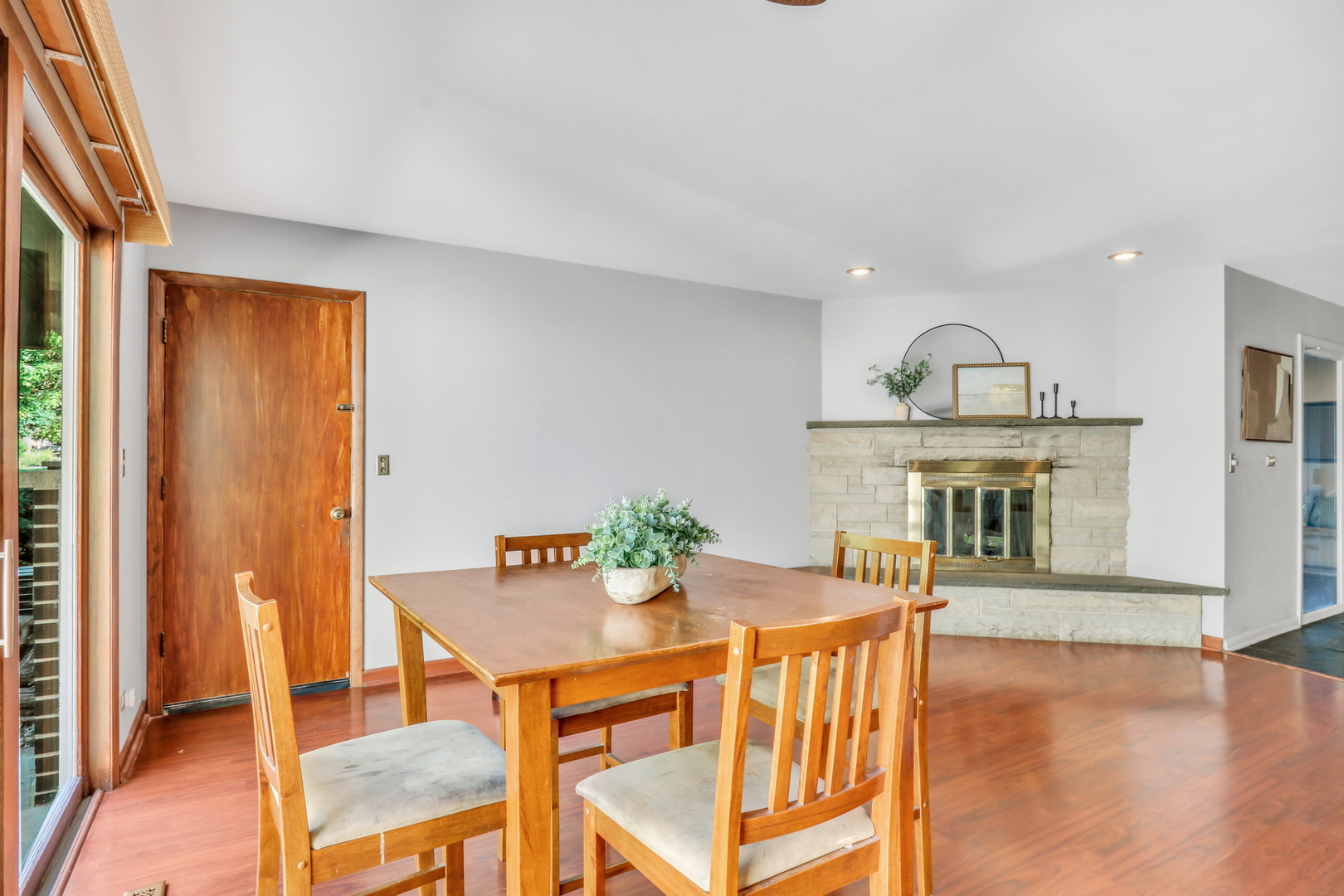 230 North Alleghany Road Grayslake, IL 60030 - Photo 16 of 53 a view of a dining room with furniture and wooden floor