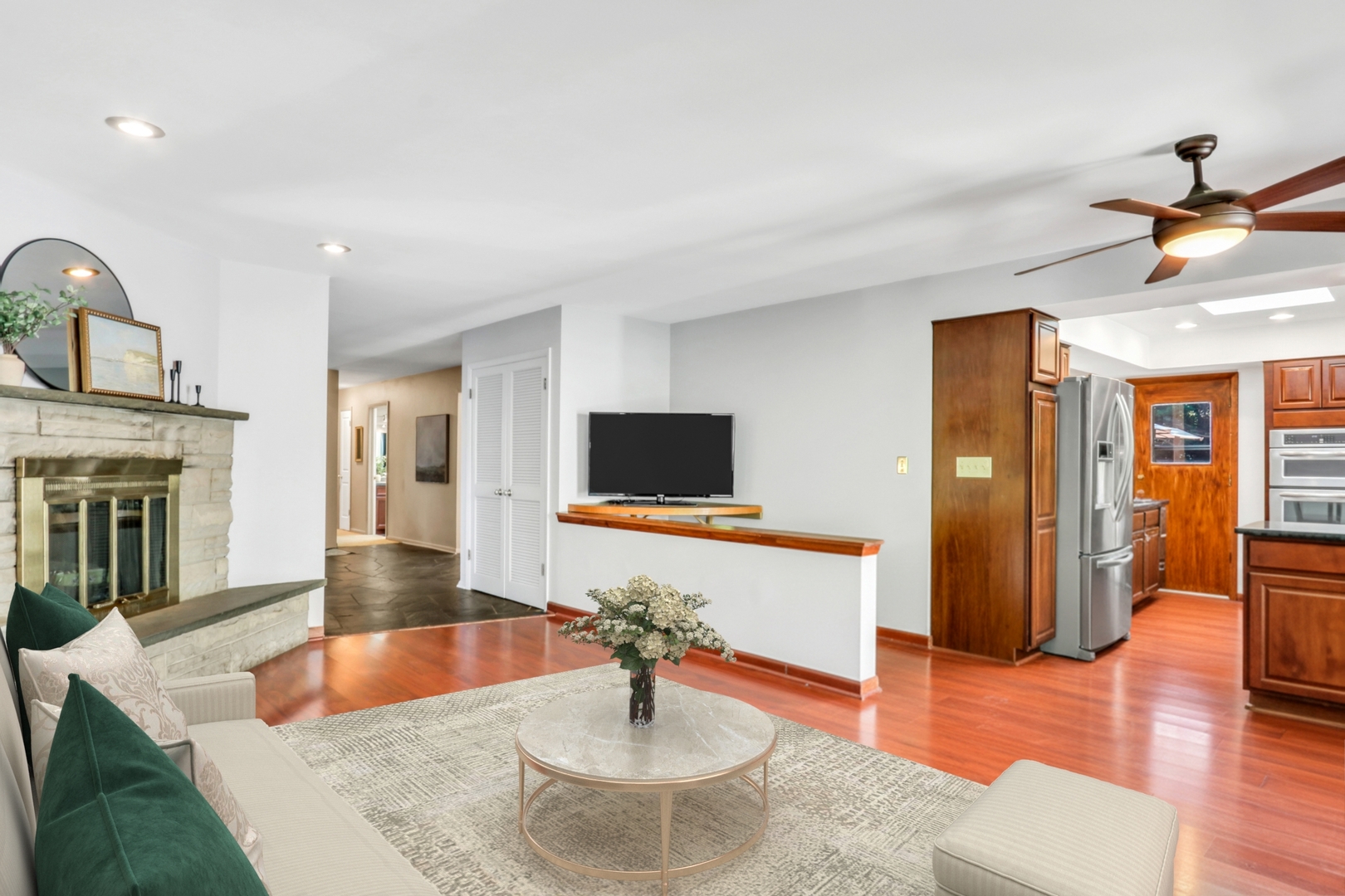 230 North Alleghany Road Grayslake, IL 60030 - Photo 19 of 53 a living room with furniture and a flat screen tv