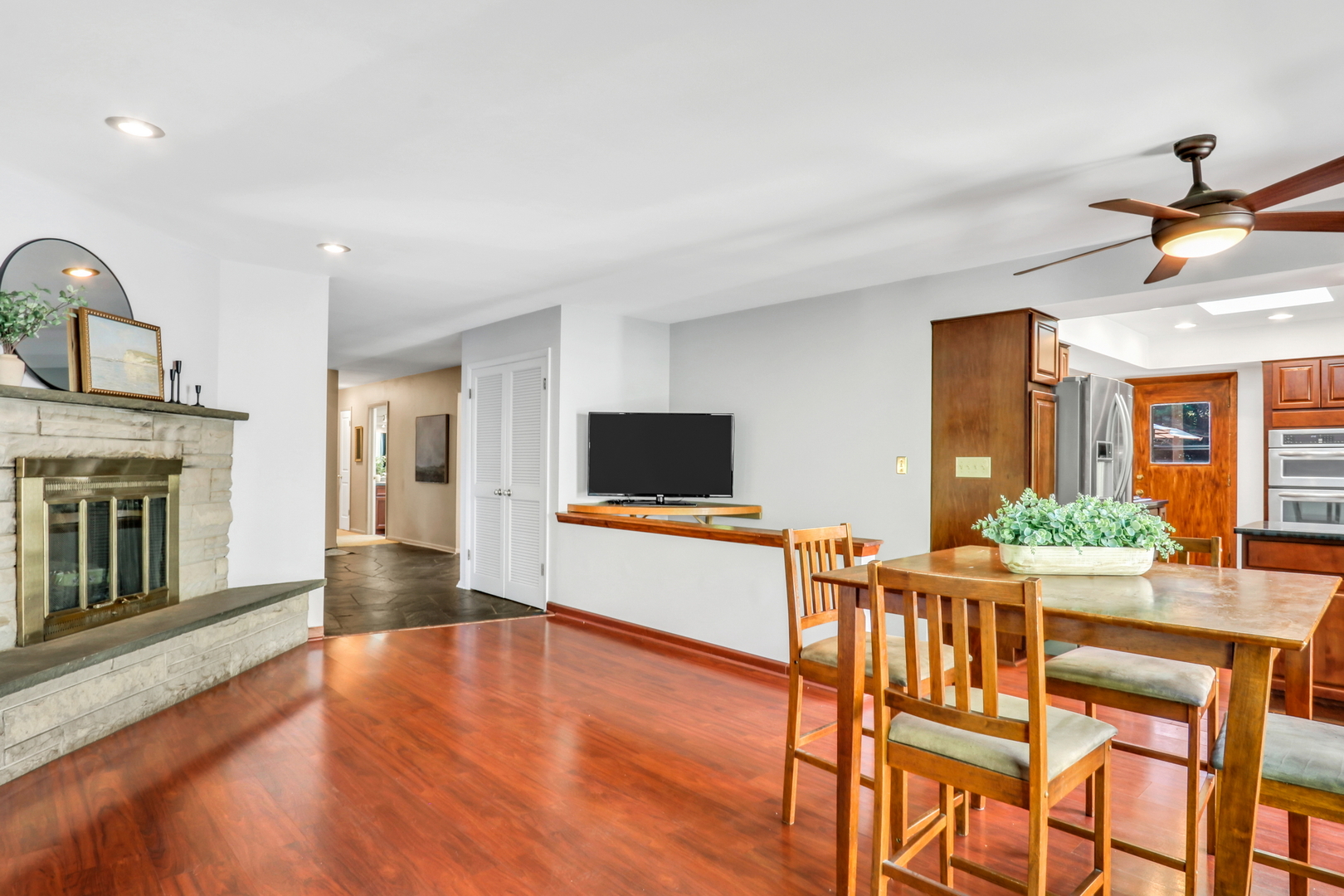230 North Alleghany Road Grayslake, IL 60030 - Photo 20 of 53 a living room with furniture and a flat screen tv