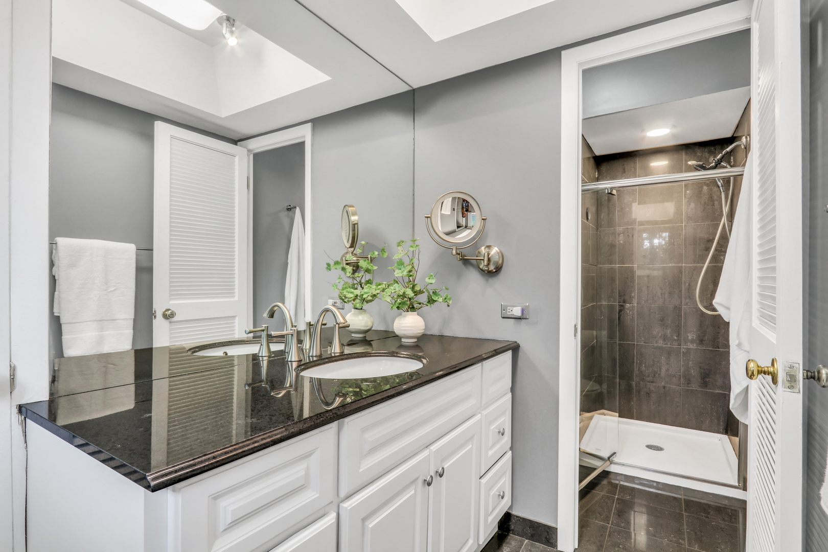 230 North Alleghany Road Grayslake, IL 60030 - Photo 26 of 53 a bathroom with a granite countertop sink a toilet and shower
