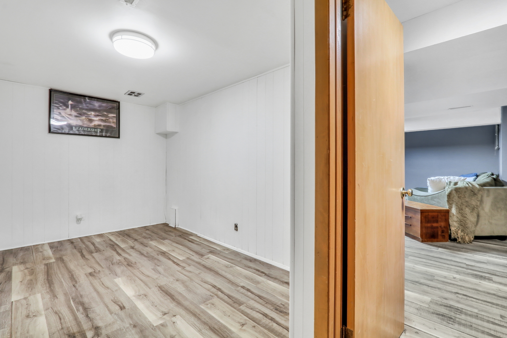 230 North Alleghany Road Grayslake, IL 60030 - Photo 36 of 53 a view of a bedroom with wooden floor