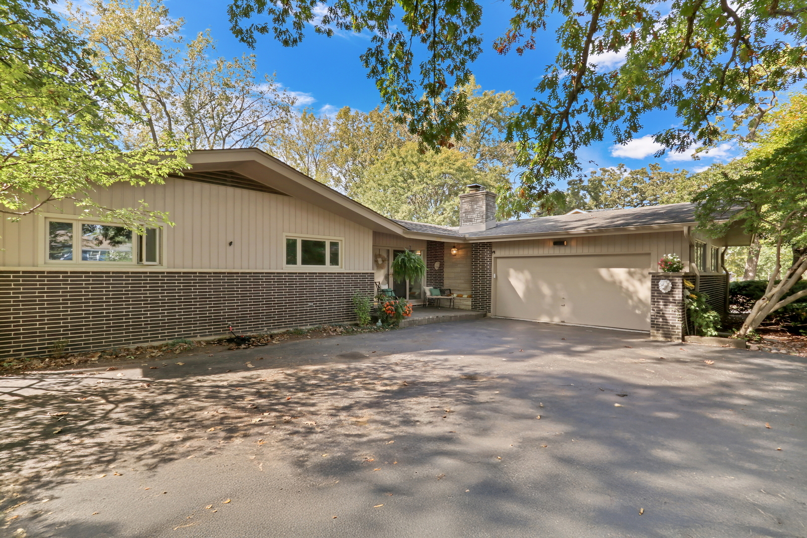 230 North Alleghany Road Grayslake, IL 60030 - Photo 49 of 53 a view of a house with a patio and a yard