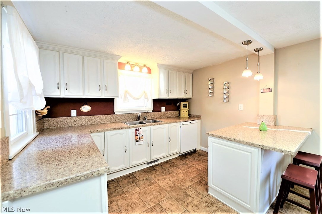 2851 Arcadia Road Akron, OH 44312 - Photo 8 of 31 * Remodeled Kitchen With New Countertops, Cabinets, Pendant Lighting ~