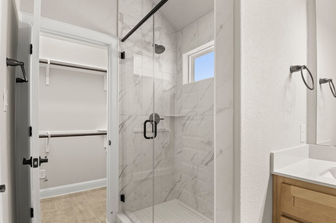 2605 Sam Bass Road, Unit 65 Round Rock, TX 78681 - Photo 25 of 33 a bathroom with a shower