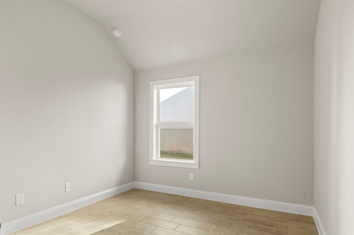 2605 Sam Bass Road, Unit 65 Round Rock, TX 78681 - Photo 27 of 33 an empty room with a window