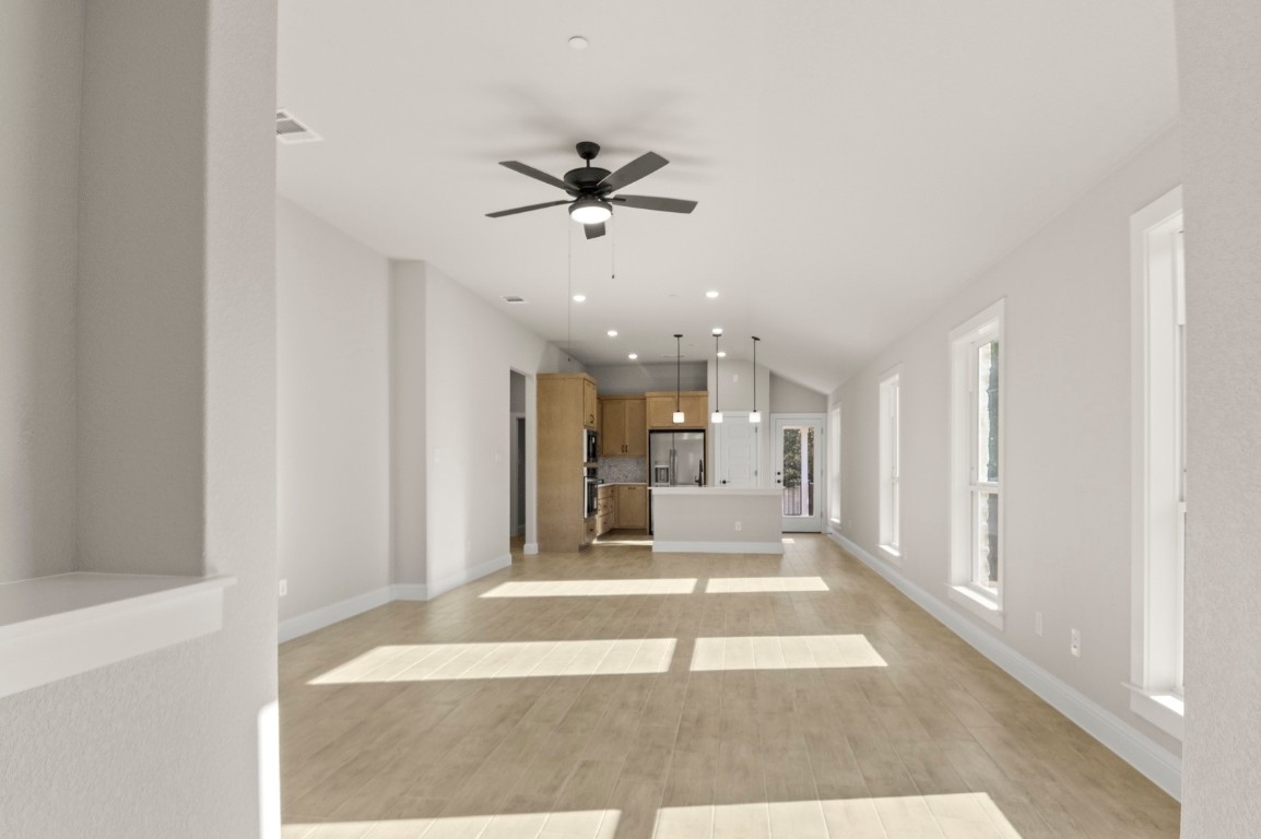 2605 Sam Bass Road, Unit 65 Round Rock, TX 78681 - Photo 9 of 33 a view of a living room with a ceiling fan