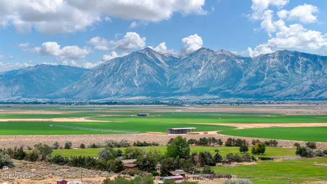 a view of a golf course with a lake