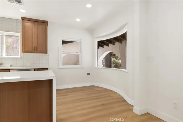 a view of a kitchen with a sink