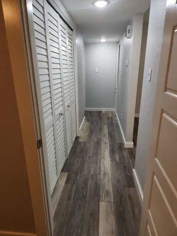 a bathroom with a toilet and a bathtub