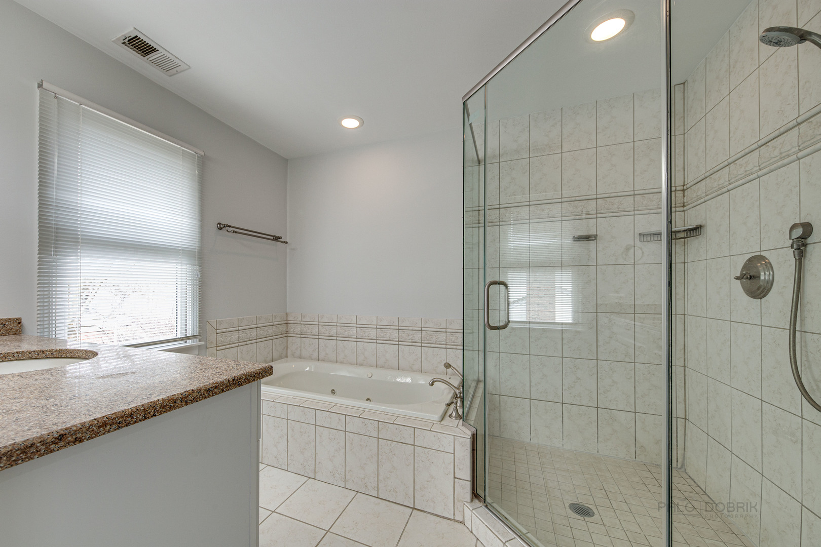 1216 Edgewood Road Lake Forest, IL 60045 - Photo 20 of 35 a bathroom with a granite countertop sink a toilet and shower