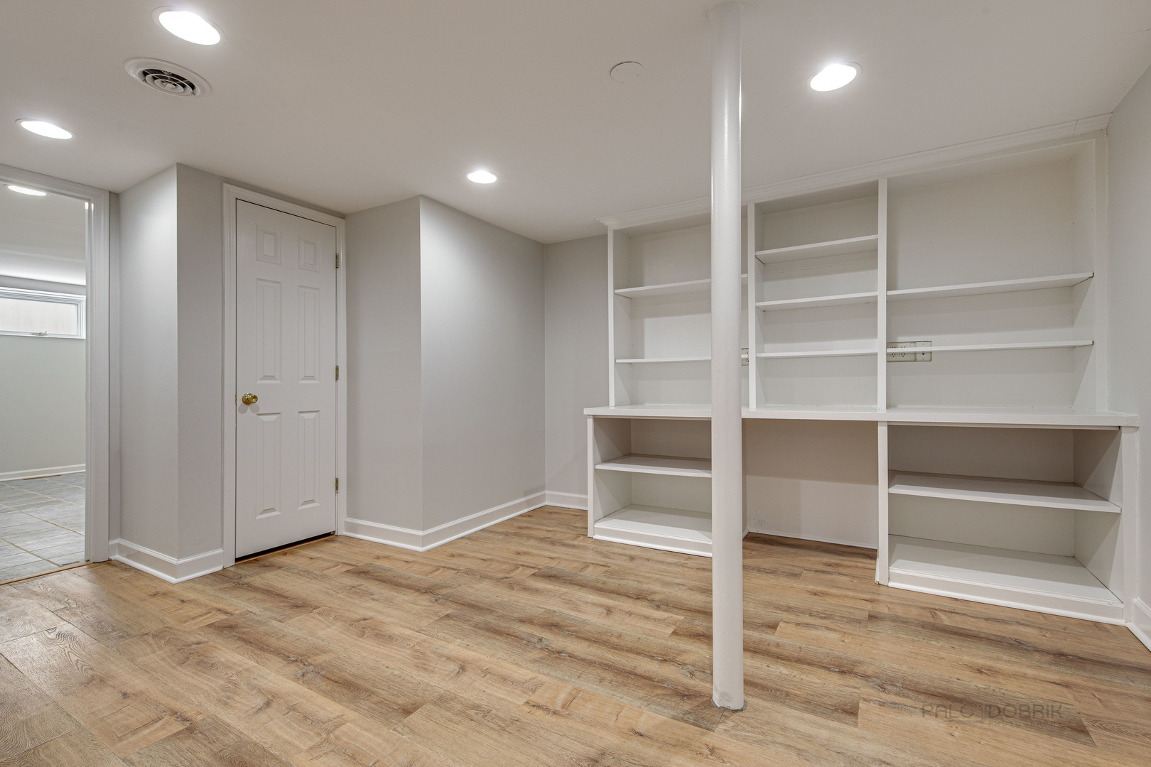 1216 Edgewood Road Lake Forest, IL 60045 - Photo 30 of 35 a view of an empty room with wooden floor and closet