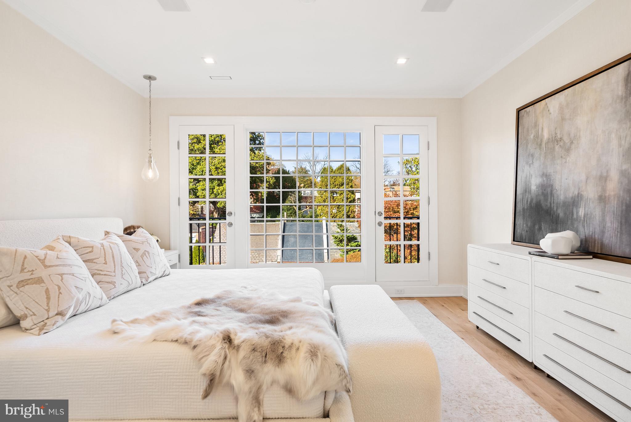 3321 Dent Place Northwest Washington, DC 20007 - Photo 14 of 29 a bedroom with a large bed and a large window