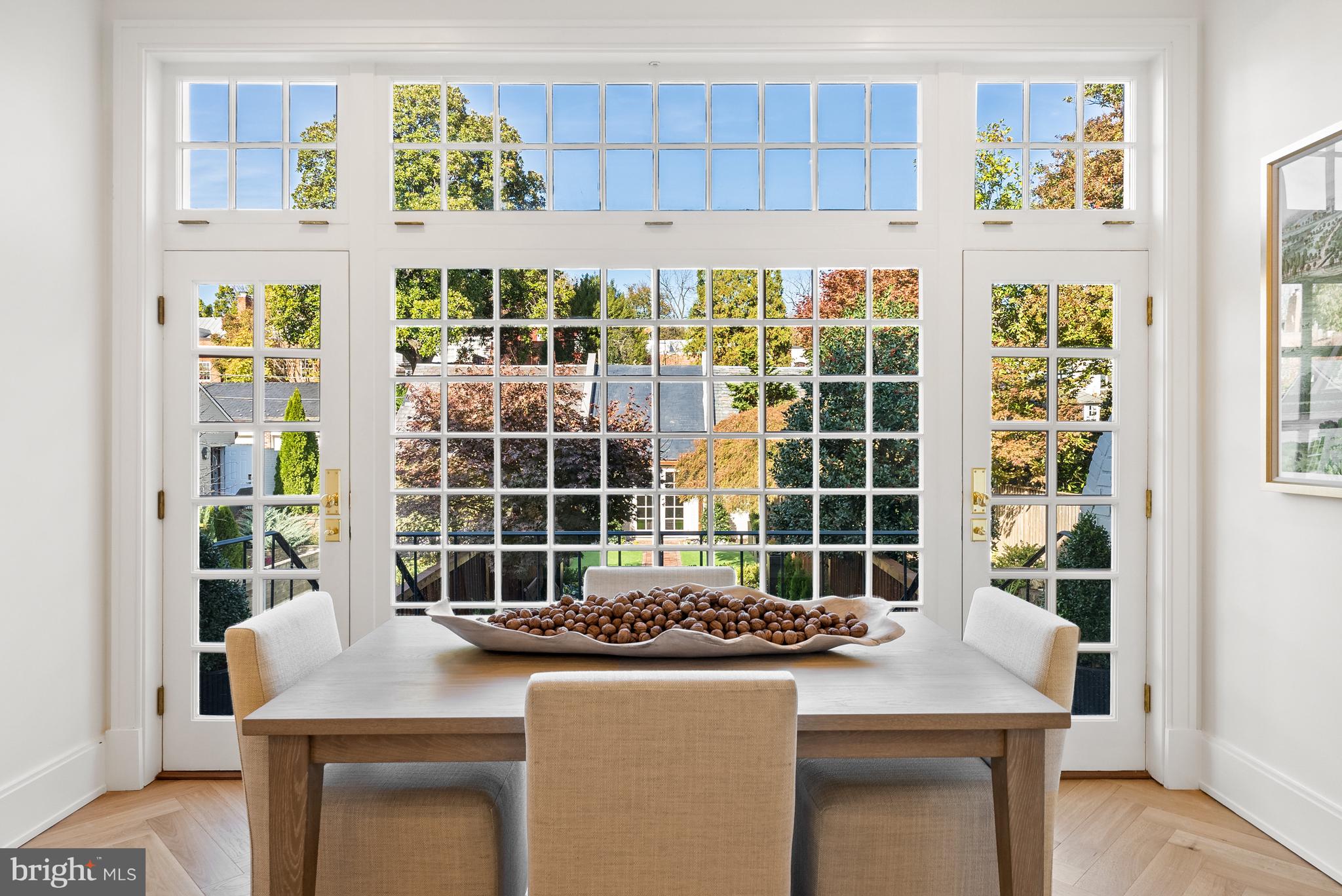 3321 Dent Place Northwest Washington, DC 20007 - Photo 4 of 29 a room with a table and chairs