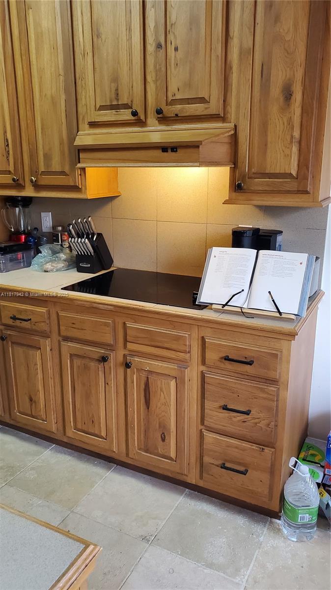 Parc Court Condominiums Plantation, FL 33324 - Photo 15 of 45 a view of cabinets with granite countertop cabinets