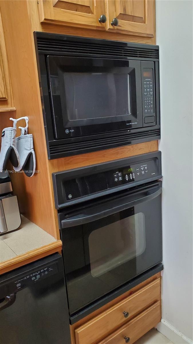 Parc Court Condominiums Plantation, FL 33324 - Photo 16 of 45 a stove top oven sitting inside of a kitchen