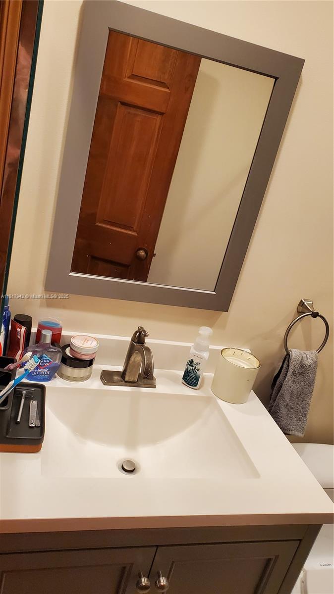 Parc Court Condominiums Plantation, FL 33324 - Photo 19 of 45 a bathroom with a sink and a mirror