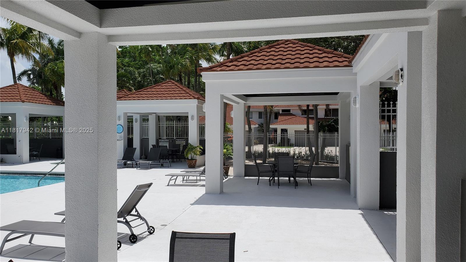 Parc Court Condominiums Plantation, FL 33324 - Photo 27 of 45 a outdoor view of a house with outdoor seating