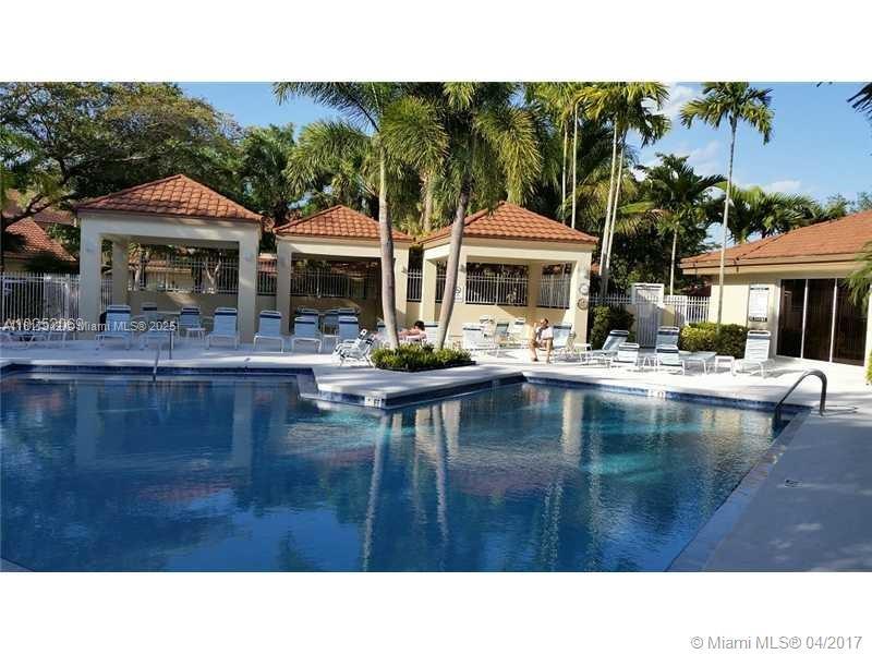 Parc Court Condominiums Plantation, FL 33324 - Photo 3 of 45 a swimming pool view with a seating space and a garden