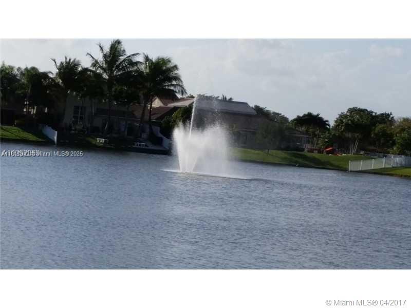 Parc Court Condominiums Plantation, FL 33324 - Photo 4 of 45 a black and white photo of a field